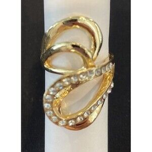 Gold  tone ring with  crystal Rhinestones. Size  19